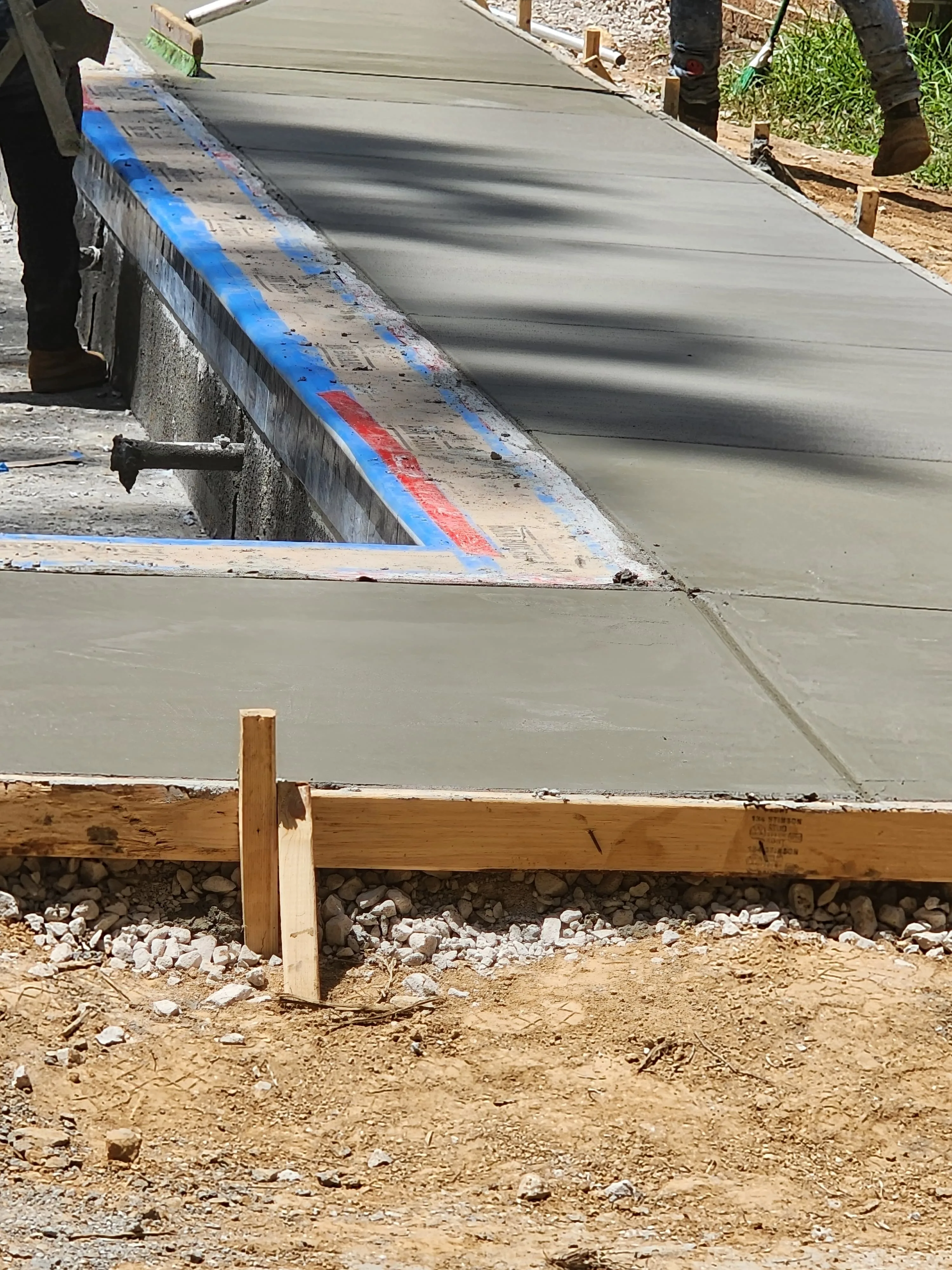 Concrete driveway pour and broom finish, Pearl, MS