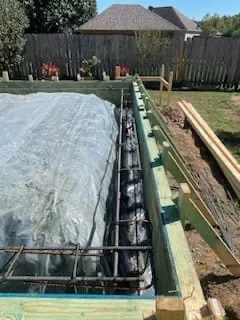 Rebar-reinforced slab formwork with curing cover, Pearl, MS