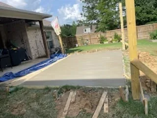 Finished concrete patio slab beside a home, Pearl, MS