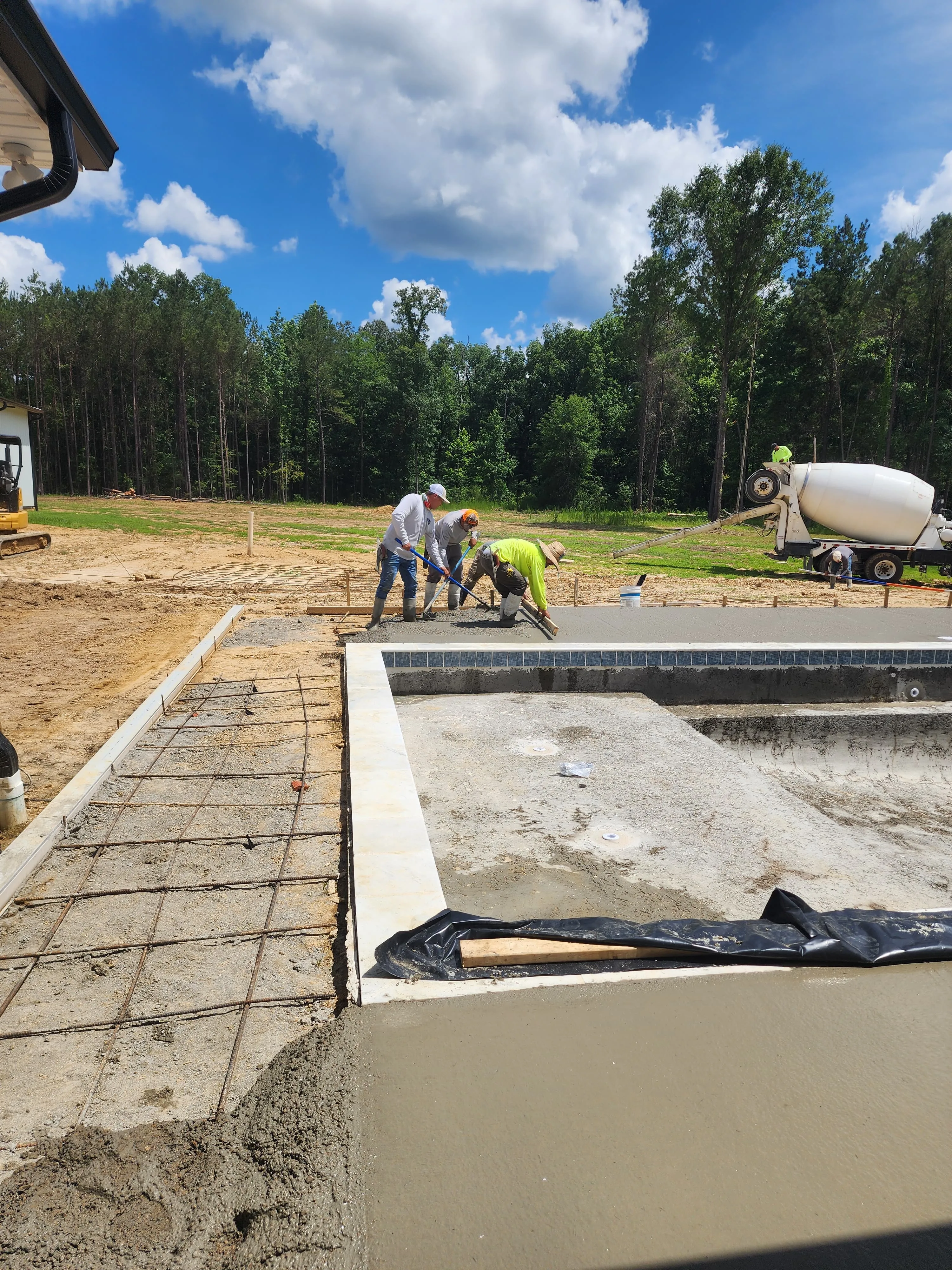 Crew preparing a site with rebar for a concrete pour, Pearl, MS